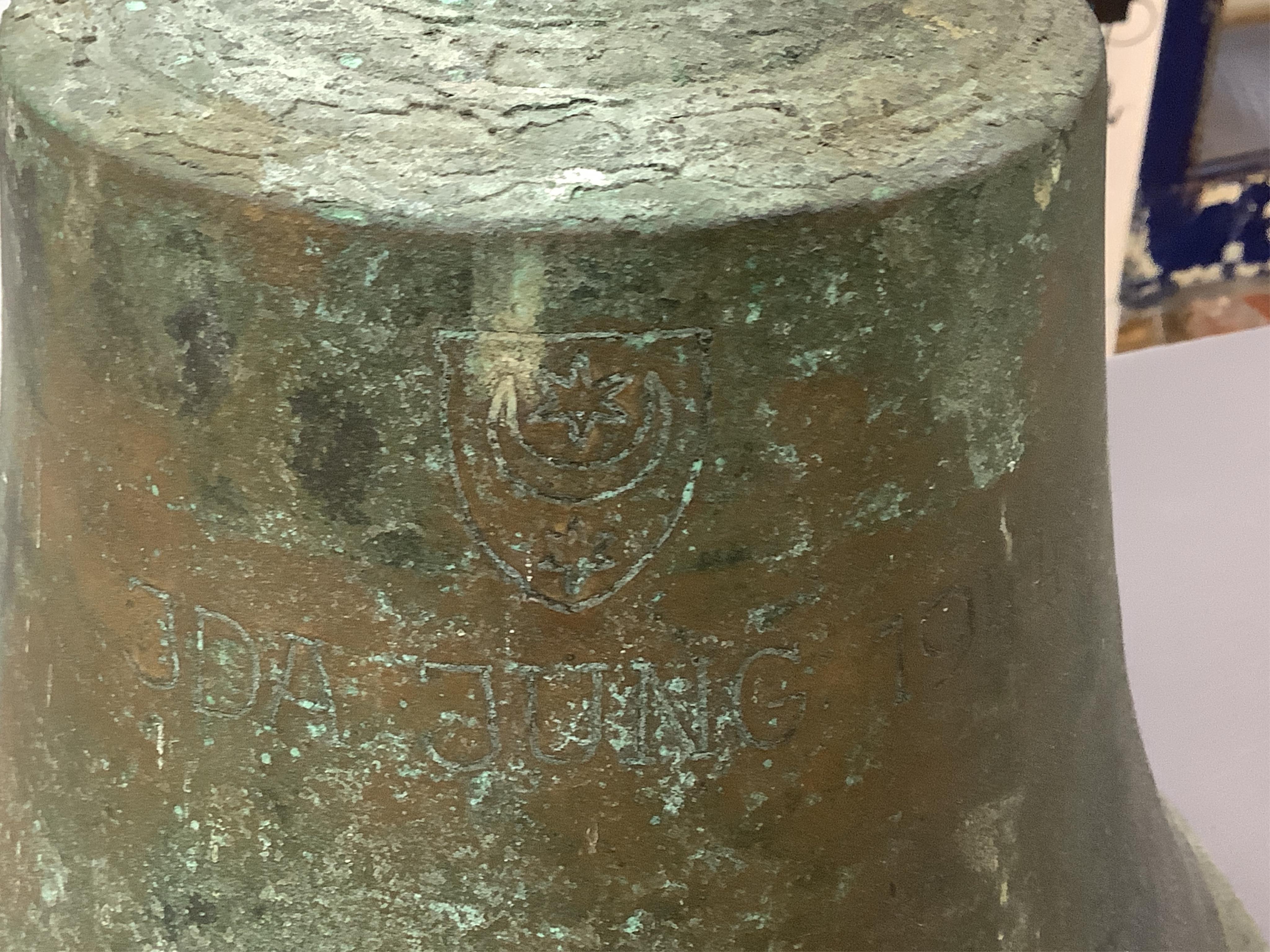 A ship’s bell, marked ‘J D A Jung 1944’, 28cm maximum height